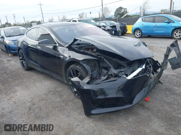 2016 Tesla Model S 90D z VIN 5YJSA1E4XGF171681, wystawiony jako IAAI lot #41836005 z przebiegiem 81 063 mil mil oraz . Historia ofert i sprzedaży dostępna na DreamBid. Obrazek 1.