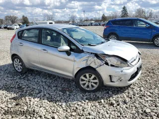 2011 Ford Fiesta SE with VIN 3FADP4EJ9BM179165, listed as a Copart auction lot 50360215 with 134,789 mi miles and Salvage Title. Bid and sale history available at carsss.com. Image 4.