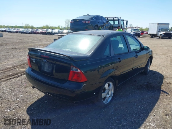 2007 Ford Focus S z VIN 1FAHP34N67W223825, wystawiony jako IAAI lot #42226952 z przebiegiem 271 842 mil mil oraz . Historia ofert i sprzedaży dostępna na DreamBid. Obrazek 4.