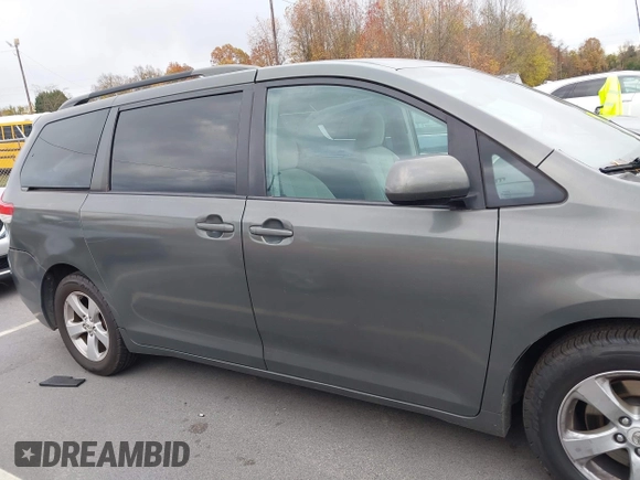 2012 Toyota Sienna LE AAS with VIN 5TDKK3DC5CS253020, listed as a IAAI auction lot 40900034 with 208,421 mi miles. Bid and sale history available at carsss.com. Image 13.