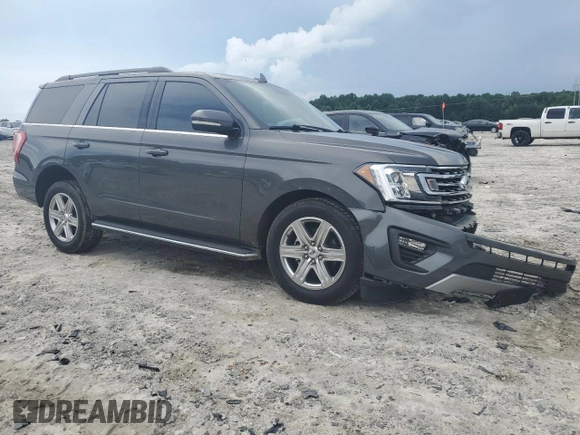 2019 Ford Expedition XLT with VIN 1FMJU1HT7KEA15609, listed as a Copart auction lot 61398885 with 57,092 mi miles and Salvage title. Bid and sale history available at DreamBid. Image 4.
