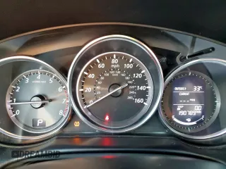 2014 Mazda CX-5 Touring with VIN JM3KE2CY5E0316077, listed as a Copart auction lot 58218735 with 190,789 mi miles and Salvage title. Bid and sale history available at DreamBid. Image 9.