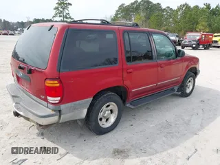 1999 Ford Explorer XLT with VIN 1FMDU34E6XZA35804, listed as a IAAI auction lot 41751506 with 192,302 mi miles and . Bid and sale history available at DreamBid. Image 4.