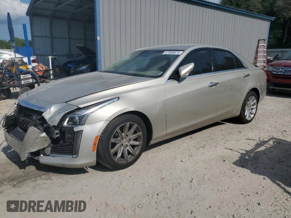 2014 Cadillac CTS Luxury RWD with VIN 1G6AR5S31E0124965, listed as a Copart auction lot 57506875 with 78,668 mi miles and Salvage title. Bid and sale history available at DreamBid. Image 1.