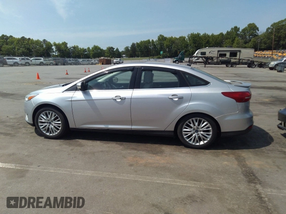 2018 Ford Focus Titanium with VIN 1FADP3J26JL280723, listed as a IAAI auction lot 42319900 with 149,583 mi miles and . Bid and sale history available at DreamBid. Image 13.