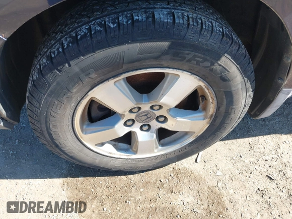 2009 Honda Pilot EX-L with VIN 5FNYF48679B011884, listed as a IAAI auction lot 41912728 with 195,904 mi miles and . Bid and sale history available at carsss.com. Image 12.