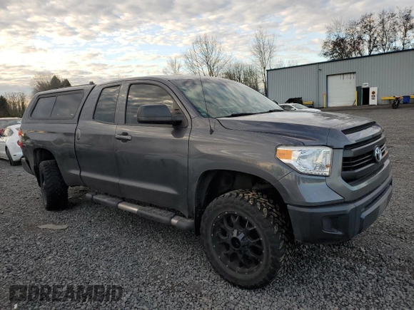 2015 Toyota Tundra 4WD Truck SR with VIN 5TFUM5F15FX063047, listed as a Copart auction lot 87409124 with 122,877 mi miles and Salvage Title. Bid and sale history available at carsss.com. Image 4.