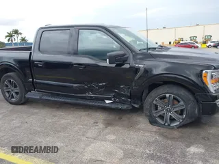 2023 Ford F-150 XL with VIN 1FTEW1C52PFA90311, listed as a IAAI auction lot 42192960 with Not Provided miles and . Bid and sale history available at DreamBid. Image 6.