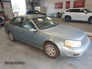 2003 Saturn LS with VIN 1G8JU54F93Y523005, listed as a IAAI auction lot 41672788 with 393,945 mi miles. Bid and sale history available at carsss.com. Image 1.