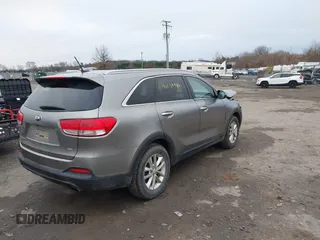 2016 Kia Sorento LX with VIN 5XYPGDA33GG145760, listed as a IAAI auction lot 41138936 with 156,010 mi miles. Bid and sale history available at carsss.com. Image 4.