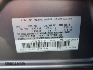 2006 Mazda 3 s with VIN JM1BK324761412942, listed as a Copart auction lot 84281714 with 198,645 mi miles and Salvage Title. Bid and sale history available at DreamBid. Image 12.