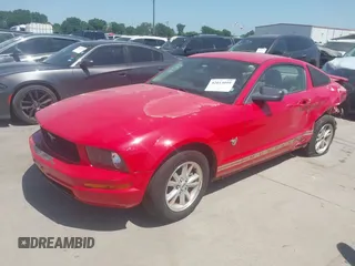 2009 Ford Mustang with VIN 1ZVHT80N295114597, listed as a IAAI auction lot 42013099 with 117,370 mi miles and . Bid and sale history available at carsss.com. Image 2.