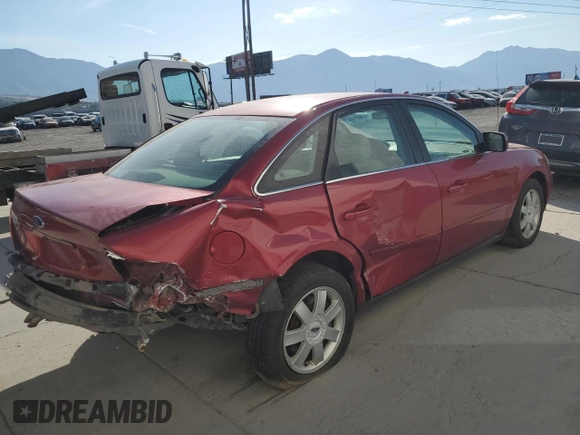 2005 Ford Five Hundred SE with VIN 1FAFP23115G159622, listed as a Copart auction lot 70700344 with 159,788 mi miles and Salvage Title. Bid and sale history available at carsss.com. Image 3.