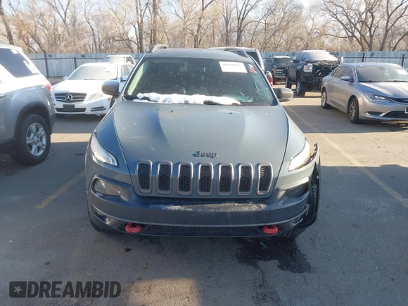 2015 Jeep Cherokee Trailhawk with VIN 1C4PJMBS3FW510219, listed as a IAAI auction lot 41440297 with 144,012 mi miles and . Bid and sale history available at DreamBid. Image 10.