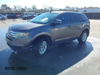 2010 Ford Edge SEL with VIN 2FMDK3JCXABA50115, listed as a IAAI auction lot 41758678 with 207,033 mi miles. Bid and sale history available at carsss.com. Image 2.