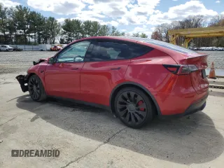 2023 Tesla Model Y Performance z VIN 7SAYGDEF2PF591238, wystawiony jako Copart lot #51991025 z przebiegiem 44 749 mil mil oraz Szkoda całkowita • Salvage title. Historia ofert i sprzedaży dostępna na DreamBid. Obrazek 2.
