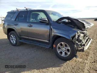 2014 Toyota 4Runner Limited with VIN JTEBU5JR2E5196830, listed as a Copart auction lot 41996595 with 170,755 mi miles and Salvage Title. Bid and sale history available at DreamBid. Image 4.