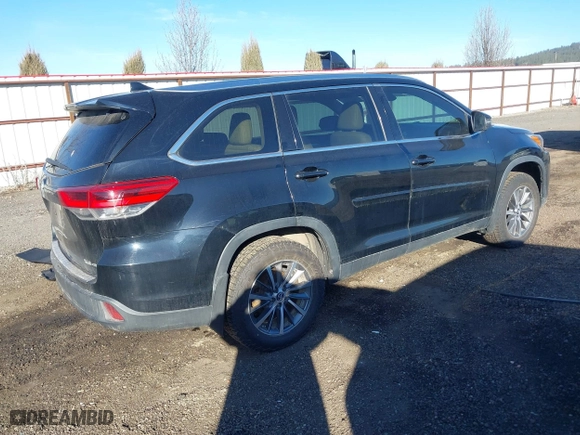 2019 Toyota Highlander SE with VIN 5TDJZRFH3KS580338, listed as a IAAI auction lot 41736059 with 128,487 mi miles. Bid and sale history available at carsss.com. Image 4.