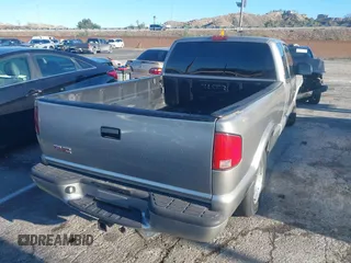 2001 GMC Sonoma SLS w/1SG Pkg with VIN 1GTCS19W818237097, listed as a IAAI auction lot 41745396 with Not Provided miles. Bid and sale history available at carsss.com. Image 4.