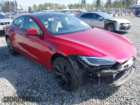 2023 Tesla Model S with VIN 5YJSA1E5XPF516779, listed as a IAAI auction lot 42110737 with 16,465 mi miles and . Bid and sale history available at DreamBid. Image 1.