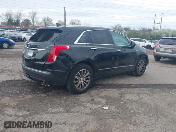 2017 Cadillac XT5 Luxury AWD with VIN 1GYKNDRS7HZ157936, listed as a IAAI auction lot 41971116 with 134,351 mi miles and . Bid and sale history available at DreamBid. Image 4.