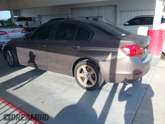 2013 BMW 3 Series 320i with VIN WBA3B1C54DK129838, listed as a IAAI auction lot 42752788 with 95,262 mi miles and . Bid and sale history available at DreamBid. Image 3.