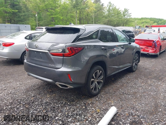 2016 Lexus RX 350 with VIN 2T2ZZMCA2GC030184, listed as a IAAI auction lot 42244658 with 107,277 mi miles and . Bid and sale history available at DreamBid. Image 4.
