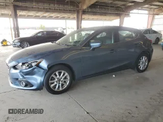2014 Mazda 3 i Touring with VIN JM1BM1L7XE1202535, listed as a Copart auction lot 64273235 with 83,944 mi miles and Salvage title. Bid and sale history available at DreamBid. Image 1.