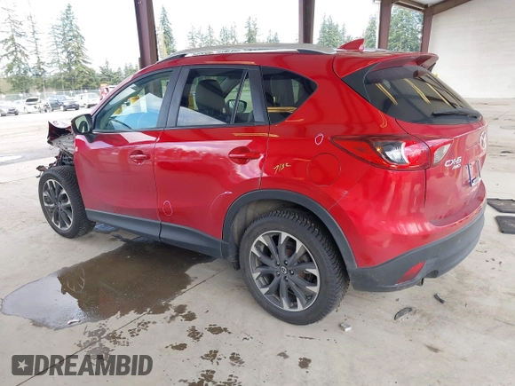 2016 Mazda CX-5 Grand Touring with VIN JM3KE4DY3G0688062, listed as a IAAI auction lot 42025169 with 59,867 mi miles and . Bid and sale history available at carsss.com. Image 3.