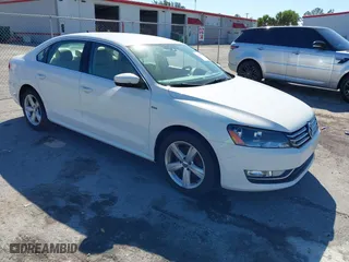 2015 Volkswagen Passat 1.8T Limited Edition with VIN 1VWAS7A36FC106926, listed as a IAAI auction lot 41784841 with 100,502 mi miles. Bid and sale history available at carsss.com. Image 1.