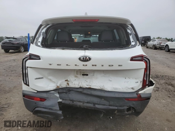 2020 Kia Telluride LX с VIN 5XYP2DHC0LG029012, выставлен на аукционе Copart как лот 61006985 с пробегом 98 025 миль миль и Списание • Salvage title. История ставок и продаж доступна на DreamBid. Изображение 6.