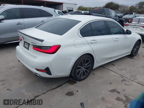 2020 BMW 3 Series 330i with VIN WBA5R1C06LFH40375, listed as a IAAI auction lot 41023872 with 98,325 mi miles and . Bid and sale history available at carsss.com. Image 4.