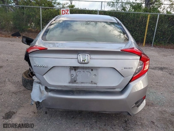 2019 Honda Civic Sedan LX with VIN 2HGFC2F62KH583213, listed as a IAAI auction lot 41935570 with 143,992 mi miles. Bid and sale history available at carsss.com. Image 17.
