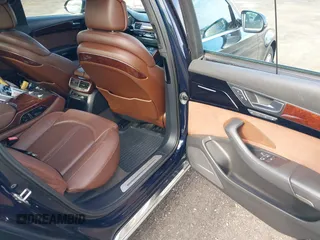 2011 Audi A8 with VIN WAURVAFD4BN018884, listed as a IAAI auction lot 42693000 with 116,952 mi miles and . Bid and sale history available at DreamBid. Image 8.