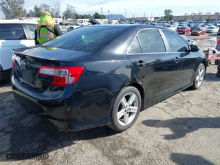 2014 Toyota Camry Hybrid LE with VIN 4T1BD1FK3EU117305, listed as a IAAI auction lot 41514217 with 141,081 mi miles. Bid and sale history available at carsss.com. Image 4.