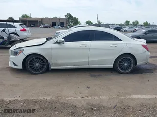 2014 Mercedes-Benz CLA-Class CLA 250 with VIN WDDSJ4GB0EN136231, listed as a IAAI auction lot 42046182 with 94,729 mi miles. Bid and sale history available at carsss.com. Image 13.