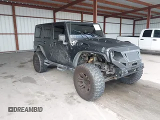 2012 Jeep Wrangler Unlimited Sport with VIN 1C4BJWDGXCL154296, listed as a IAAI auction lot 42748480 with 100,921 mi miles and . Bid and sale history available at DreamBid. Image 1.