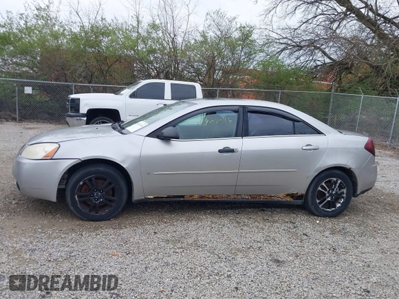 2006 Pontiac G6 6-Cyl z VIN 1G2ZG558064154096, wystawiony jako IAAI lot #41987316 z przebiegiem 221 130 mil mil oraz . Historia ofert i sprzedaży dostępna na DreamBid. Obrazek 15.