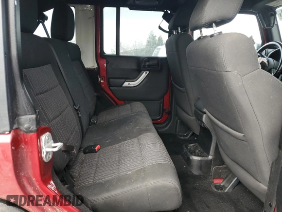 2012 Jeep Wrangler Unlimited Rubicon with VIN 1C4HJWFG2CL219021, listed as a Copart auction lot 87451784 with 109,675 mi miles and Salvage title. Bid and sale history available at DreamBid. Image 12.