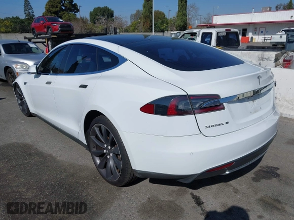2014 Tesla Model S 60 with VIN 5YJSA1H15EFP46980, listed as a IAAI auction lot 41583672 with 61,080 mi miles and . Bid and sale history available at DreamBid. Image 3.