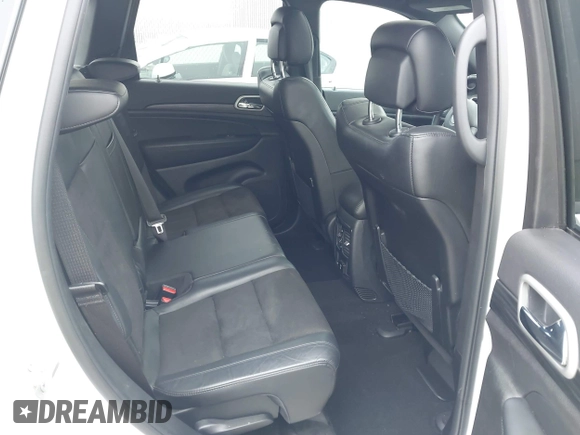 2021 Jeep Grand Cherokee Laredo E with VIN 1C4RJEAG7MC713026, listed as a IAAI auction lot 42010894 with 37,336 mi miles and . Bid and sale history available at DreamBid. Image 8.