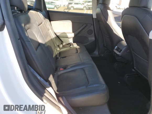 2020 Tesla Model Y Long Range with VIN 5YJYGDEE4LF015455, listed as a Copart auction lot 84223984 with 77,398 mi miles and Salvage Title. Bid and sale history available at DreamBid. Image 10.