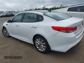 2016 Kia Optima EX with VIN 5XXGU4L31GG086203, listed as a IAAI auction lot 42128099 with 157,988 mi miles. Bid and sale history available at carsss.com. Image 3.