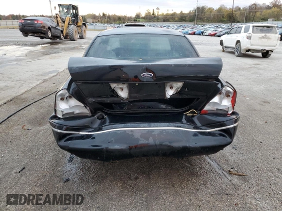2000 Ford Crown Victoria LX z VIN 2FAFP74W3YX122481, wystawiony jako Copart lot #79189794 z przebiegiem 277 772 mil mil oraz Nie do naprawy • Non repairable. Historia ofert i sprzedaży dostępna na DreamBid. Obrazek 6.