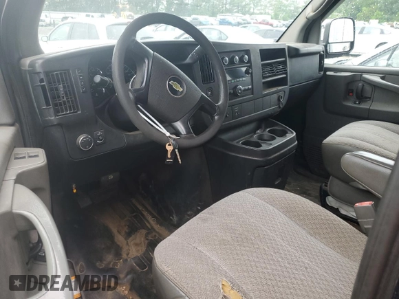 2013 Chevrolet Express Cargo with VIN 1GCWGFCA3D1125104, listed as a Copart auction lot 56348725 with Not provided miles and Salvage title. Bid and sale history available at DreamBid. Image 8.