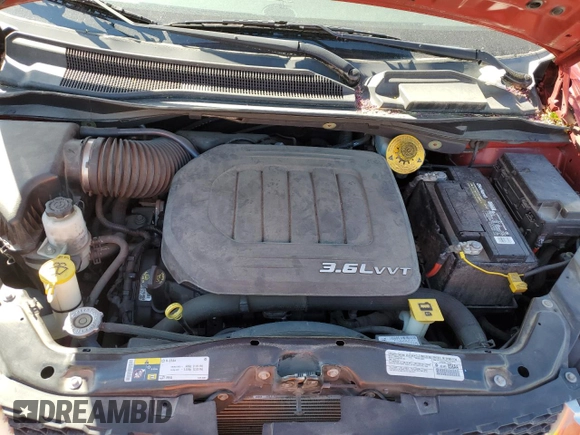 2014 Dodge Grand Caravan SXT with VIN 2C4RDGCG5ER182160, listed as a Copart auction lot 54140505 with 61,576 mi miles and Salvage Title. Bid and sale history available at DreamBid. Image 12.