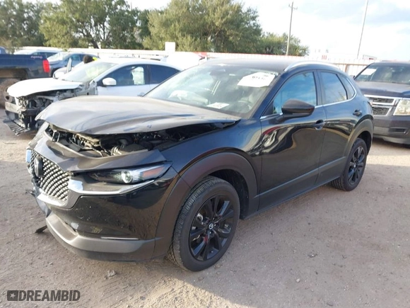 2024 Mazda CX-30 2.5 S Select Sport with VIN 3MVDMBBM5RM700297, listed as a IAAI auction lot 40971467 with 11306 miles. Bid and sale history available at carsss.com. Image 2.