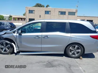2018 Honda Odyssey Touring with VIN 5FNRL6H81JB022975, listed as a IAAI auction lot 42653304 with 210,137 mi miles and . Bid and sale history available at DreamBid. Image 15.