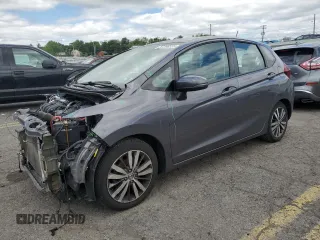 2015 Honda Fit EX-L z VIN 3HGGK5H8XFM776885, wystawiony jako Copart lot #57298225 z przebiegiem Nie podano mil oraz Szkoda całkowita • Salvage title. Historia ofert i sprzedaży dostępna na DreamBid. Obrazek 1.
