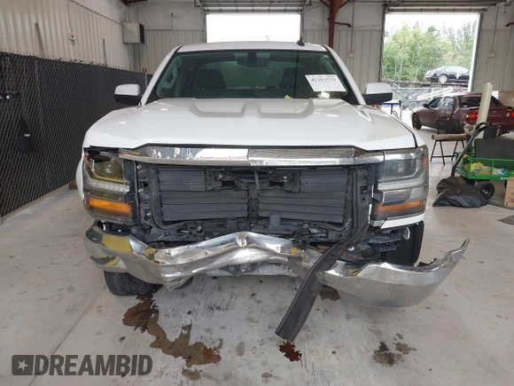 2018 Chevrolet Silverado 1500 LT with VIN 1GCRCREC0JZ204834, listed as a IAAI auction lot 41363579 with 135,247 mi miles and . Bid and sale history available at DreamBid. Image 6.
